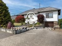 Wohnimmobilie Kauf Einfamilienhaus Ausbaufähiger Bungalow mit gepflegter Gartenanlage!