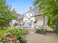 Wohnimmobilie Kauf Einfamilienhaus Ihre Oase im Grünen: Charmantes Einfamilienhaus in begehrter Rheinbacher Wohnlage