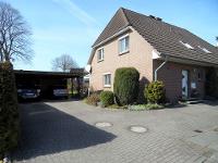 Wohnimmobilie Kauf Einfamilienhaus Aparte Doppelhaushälfte mit Wintergarten und Doppelcarport