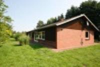 Wohnimmobilie Kauf Einfamilienhaus Skandinavischer Bungalow mit Kaminofen und erholsamen Weitblick