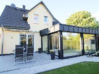 Wohnimmobilie Kauf Einfamilienhaus Schön aufgeteiltes Eigenheim mit Wintergarten und ruhigem Garten