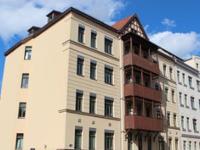 Wohnimmobilie Kauf Etagenwohnung Stilvolle Eigentumswohnung mit Balkon in Zentrumsnähe - Aufzug - Stellplatz