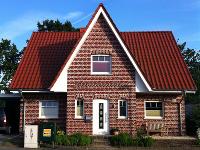 Wohnimmobilie Kauf Einfamilienhaus Friesenhaus mit großem Garten - KFW 60 - Wie für Sie gemacht!