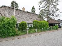 Wohnimmobilie Kauf Einfamilienhaus Romantisches Reet-Häuschen -Mitten im Ort von Schuby !