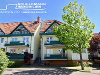 Wohnimmobilie Kauf Erdgeschosswohnung Renovierte Dreiraumwohnung mit Wintergarten, Balkon und TG- Stellplatz in der Erfurter Roten Berg Siedlung