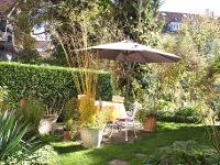 Wohnimmobilie Kauf Erdgeschosswohnung 4-Zimmer Wohnung mit sehr großem Garten