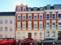 Wohnimmobilie Kauf Etagenwohnung Vermietete 2-Zimmerwohnung mit Balkon in historischen Stilaltbau