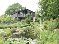 Wohnimmobilie Kauf Einfamilienhaus Idylle - Haus mit Einliegerwohnung und Gartenparadies
